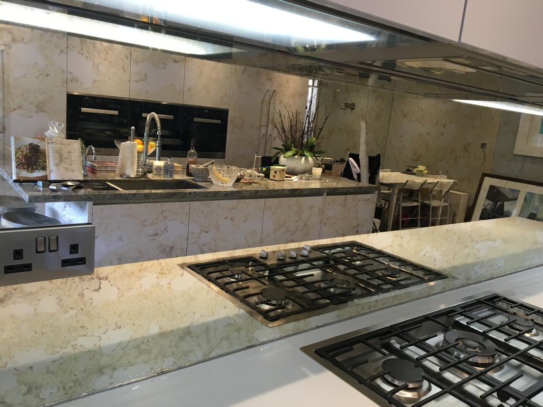 Mirror glass splashback in Acton luxury kitchen